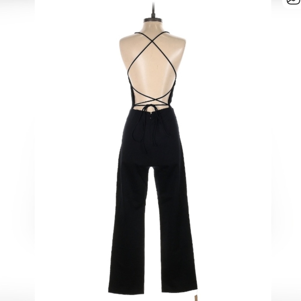 NWOT lace up back Reformation jumpsuit